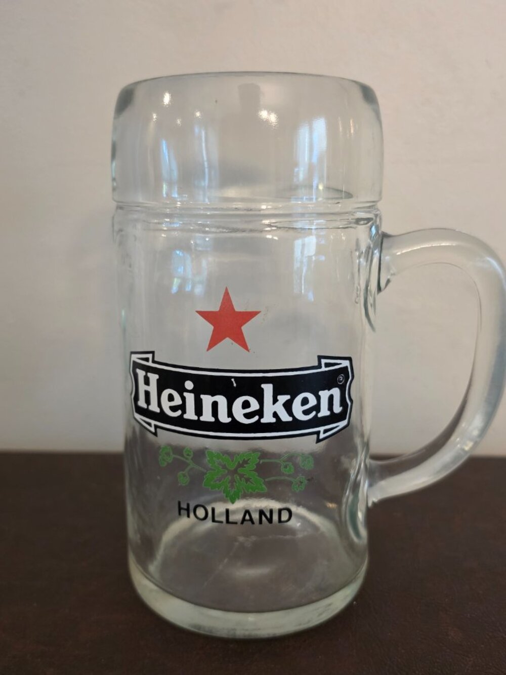 Vintage Heineken Holland glass beer mug features the iconic red star design